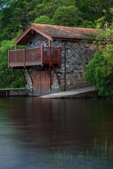 BOAT HOUSE: A building especially designed for the storage of boats, normally smaller craft for sports or leisure use. These are typically located on ... stored are rowing boats or small motor boats.